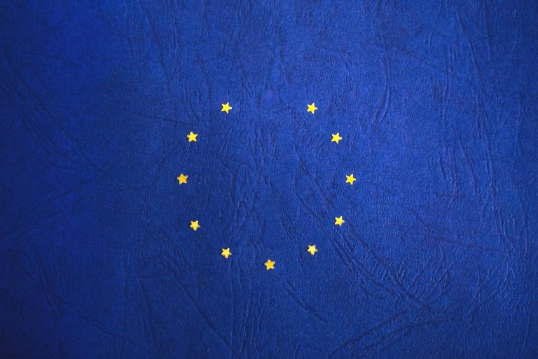 European Union flag with missing stars representing Brexit concept.